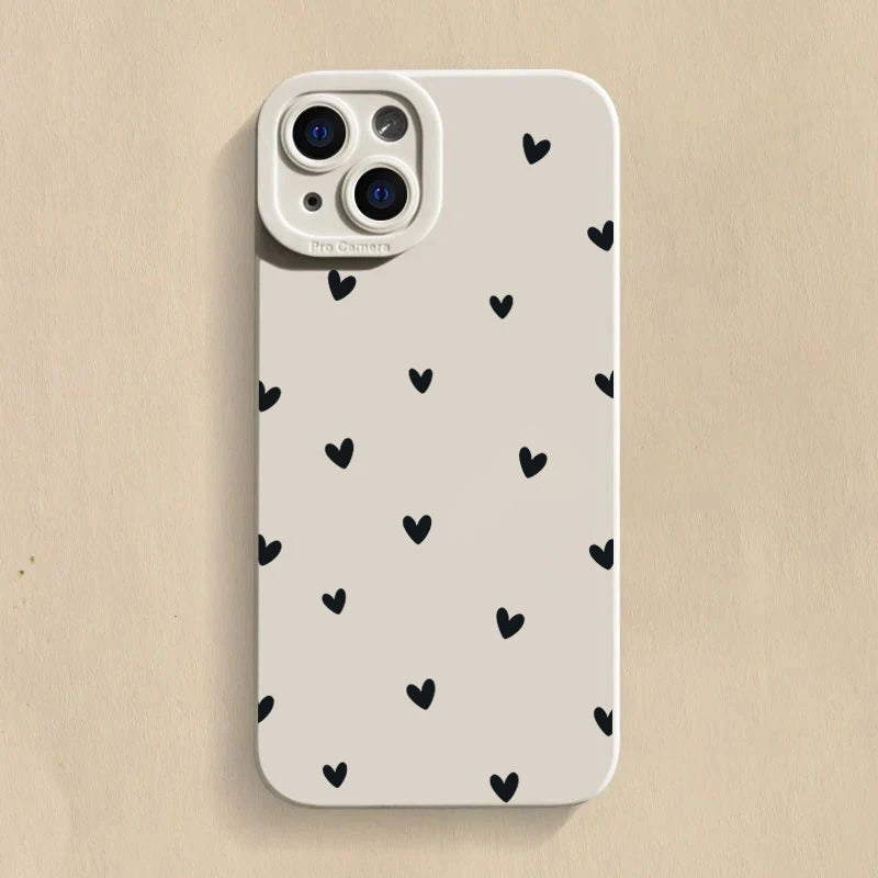 Black phone case with heart pattern.