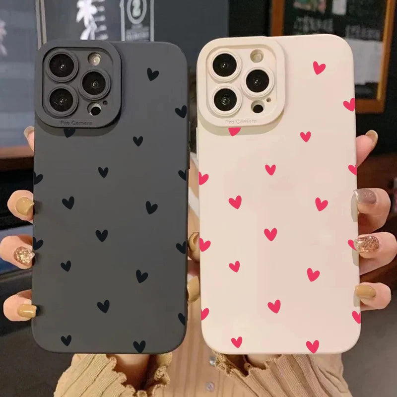 Black phone case with heart pattern.